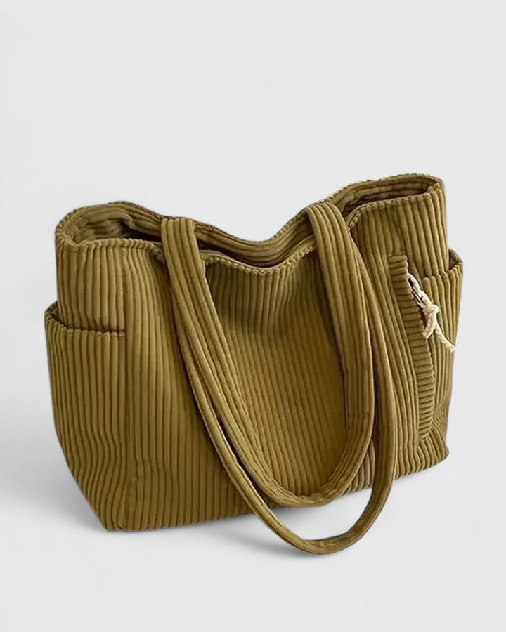 Silvia | Ylellinen ribbed-laukku trendikkäillä nyörinyksityiskohdilla