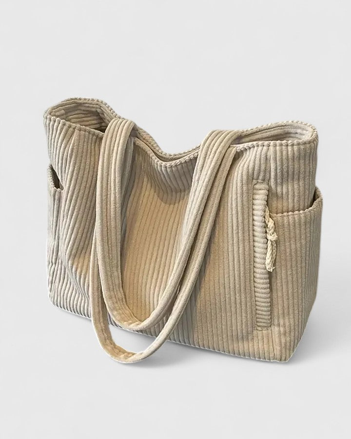 Silvia | Ylellinen ribbed-laukku trendikkäillä nyörinyksityiskohdilla